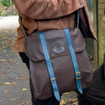theo chocolate and blue leather bag